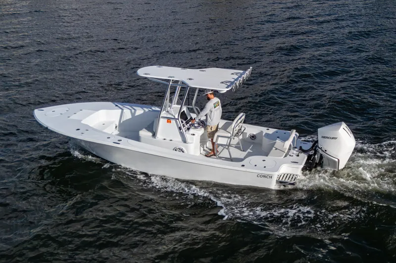 The Image of 2022 Conch 25 boat cruising on water with Mercury outboard engine. - 0