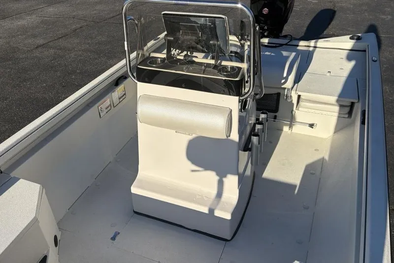 Slide: The Image of 2024 Ranger RB200 boat interior with console and seating, showcasing modern design and functionality. - 19
