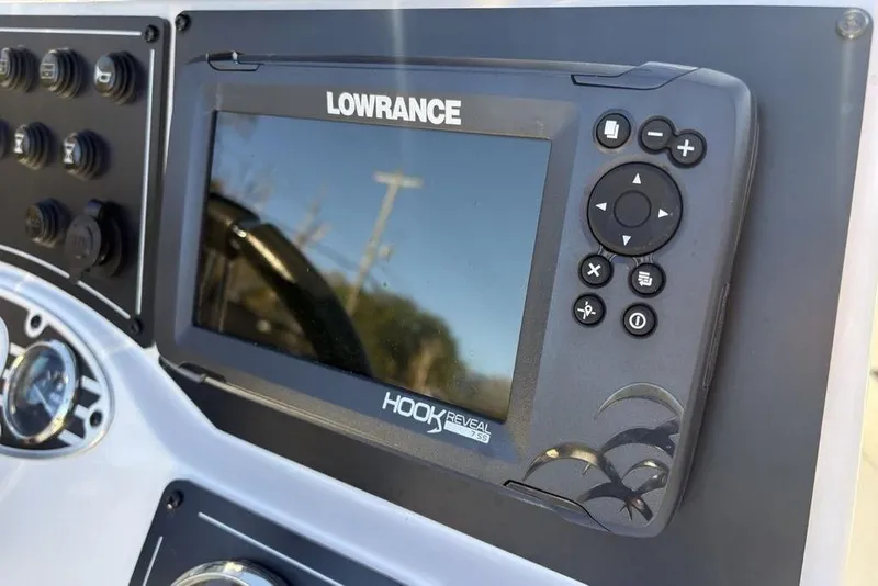 Slide: The Image of 2024 Ranger RB200 boat dashboard with Lowrance Hook Reveal fish finder. - 21