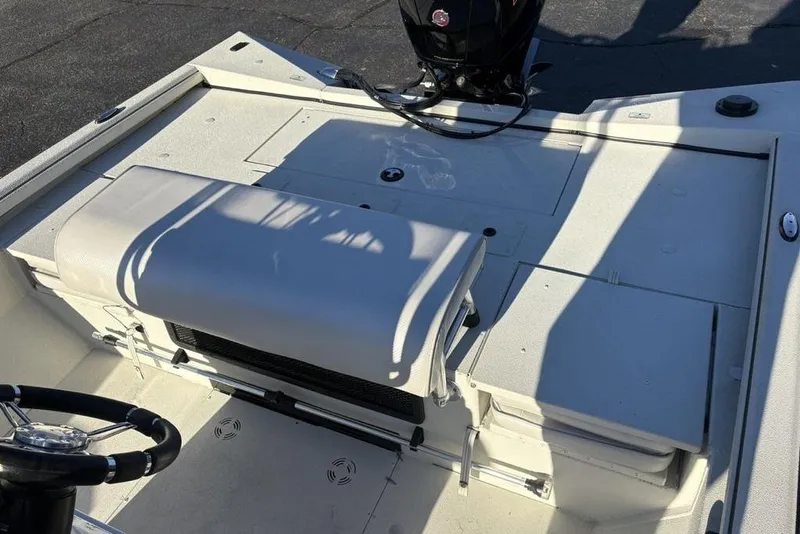Slide: The Image of 2024 Ranger RB200 boat interior with seating and steering wheel, showcasing modern design. - 32