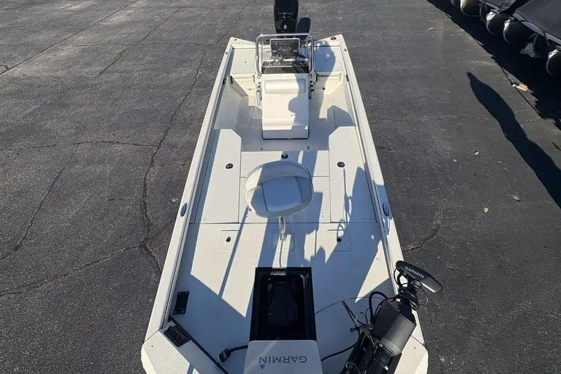 Slide: The Image of 2024 Ranger RB200 boat with Garmin equipment, viewed from above on a paved surface. - 35