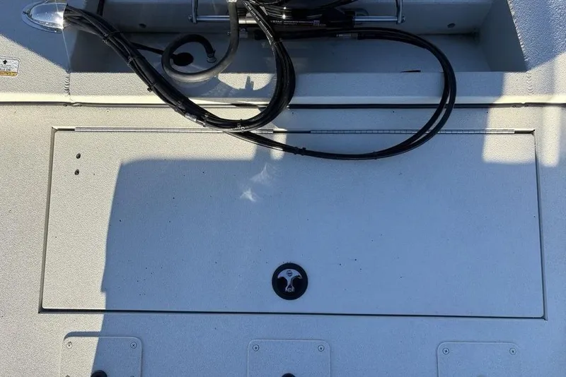 Slide: The Image of 2024 Ranger RB200 boat deck with cables and hatch, top view. - 37