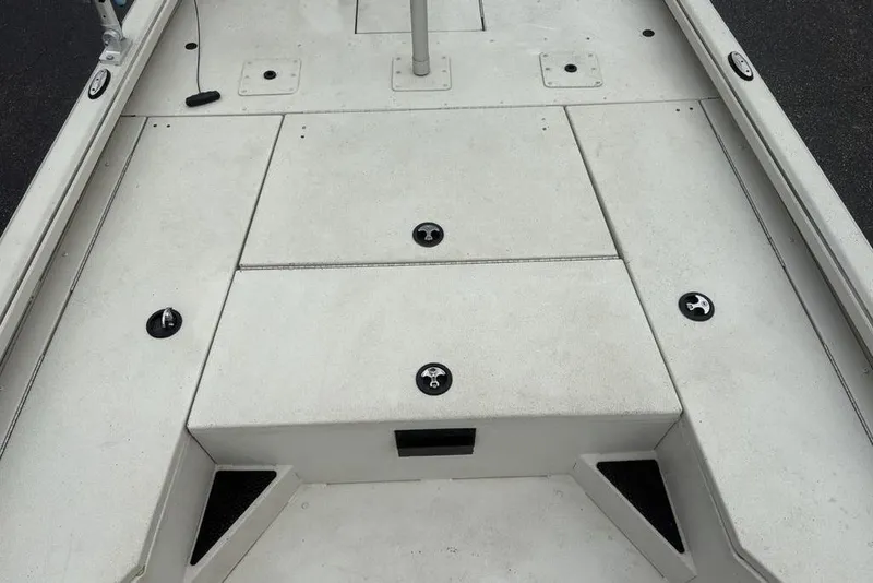 Slide: The Image of 2022 Ranger RB200 boat deck with storage compartments and fixtures. - 10