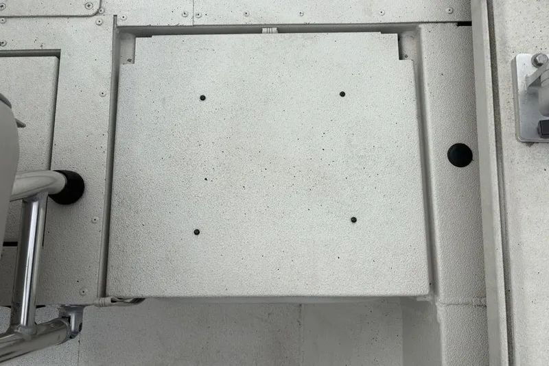 Slide: The Image of 2022 Ranger RB200 boat deck with textured surface and metal fixtures. - 14