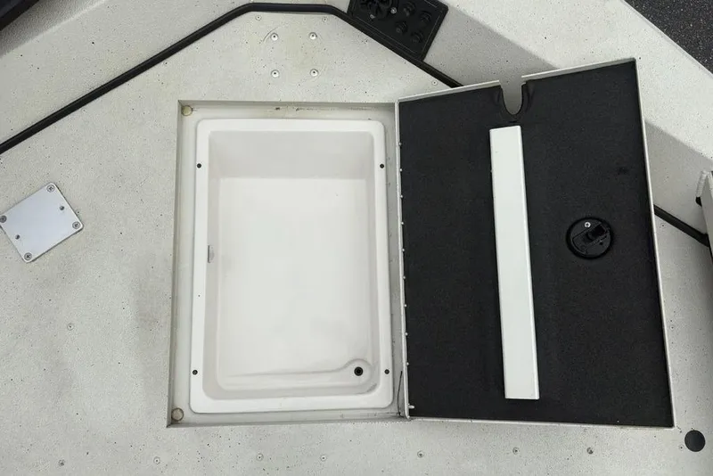 Slide: The Image of Open storage compartment on 2022 Ranger RB200 boat deck. - 8