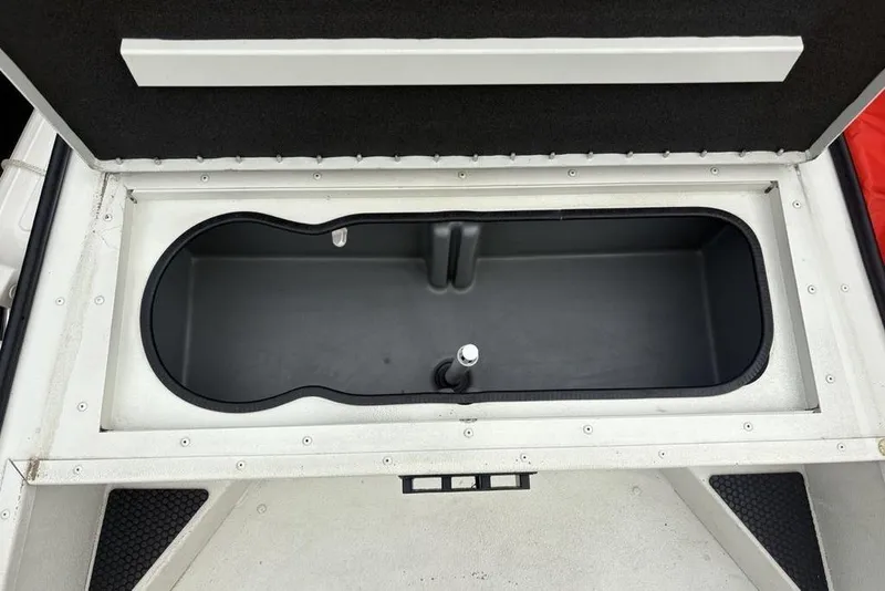 Slide: The Image of 2022 Ranger RB200 boat storage compartment, open lid, spacious interior. - 9