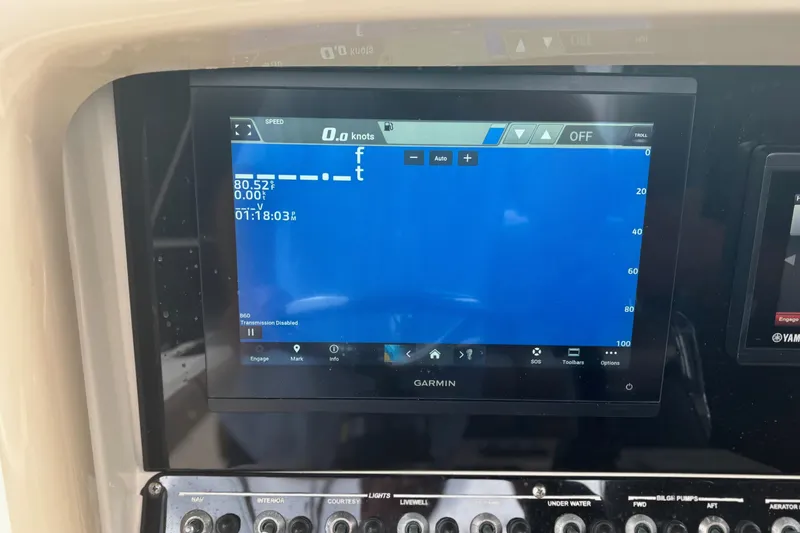 Slide: The Image of Garmin display on 2013 Scout 275 LXF boat showing speed and depth data. - 17