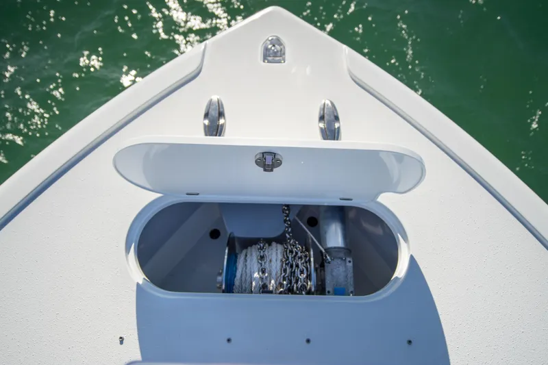 Slide: The Image of Bow of 2022 Yellowfin 39 Offshore boat with anchor storage open. - 31