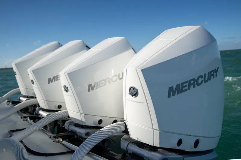 Slide: The Image of Four Mercury outboard engines on a 2022 Yellowfin 39 Offshore boat. - 33
