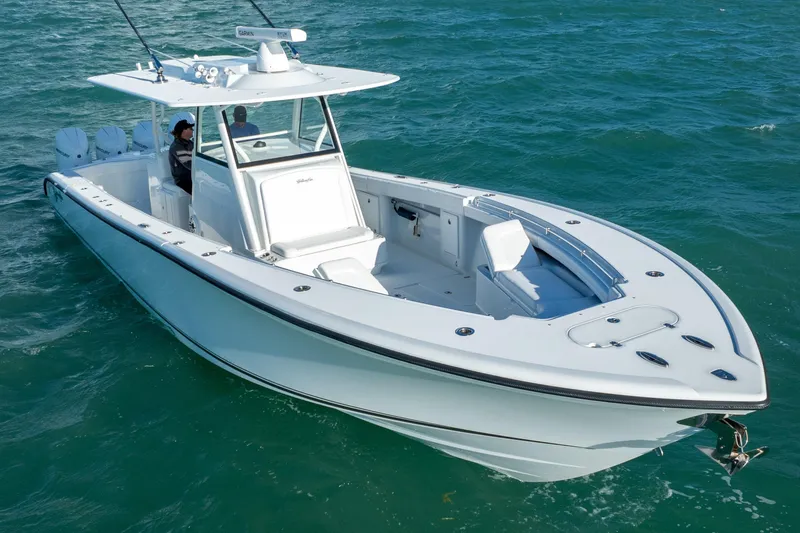 Slide: The Image of 2022 Yellowfin 39 Offshore boat cruising on open water. - 5
