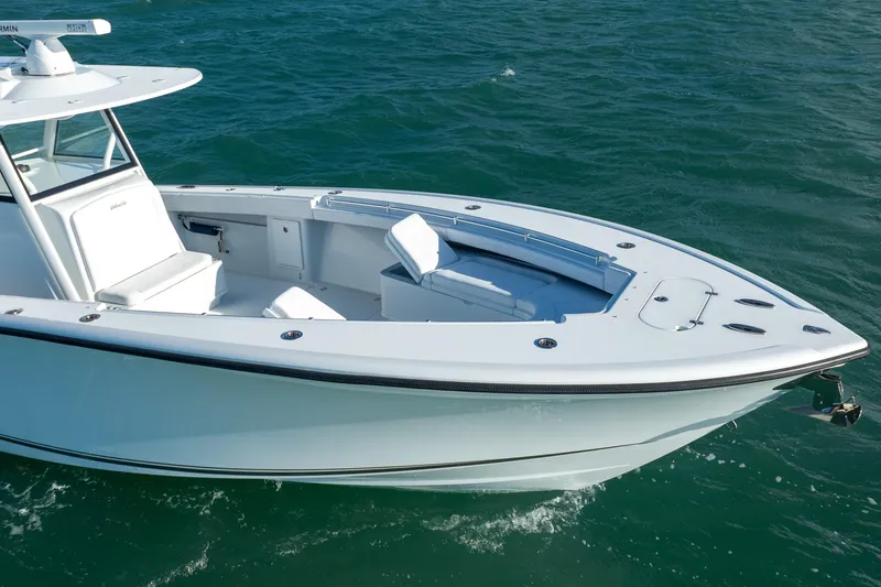 Slide: The Image of 2022 Yellowfin 39 Offshore boat cruising on open water. - 6