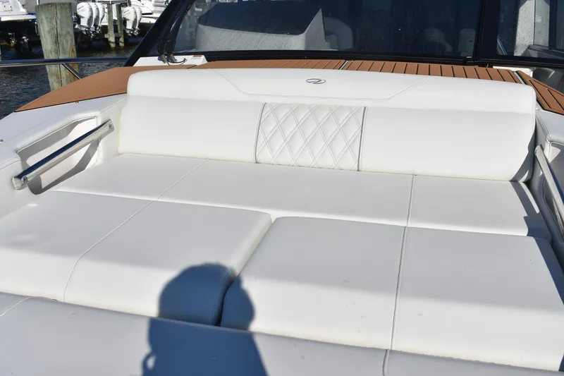 Slide: The Image of Luxurious seating on 2024 Regal 36 XO boat with white upholstery and elegant design. - 42