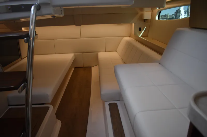 Slide: The Image of Luxurious interior of 2024 Regal 36 XO yacht with plush seating and modern design. - 58