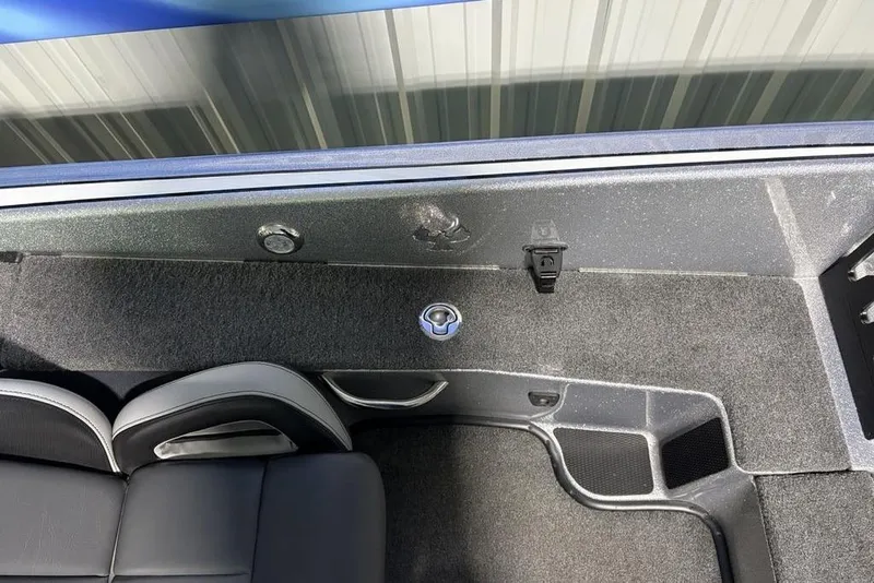 Slide: The Image of 2024 Phoenix 920 Elite interior with sleek seating and carpeted flooring. - 15