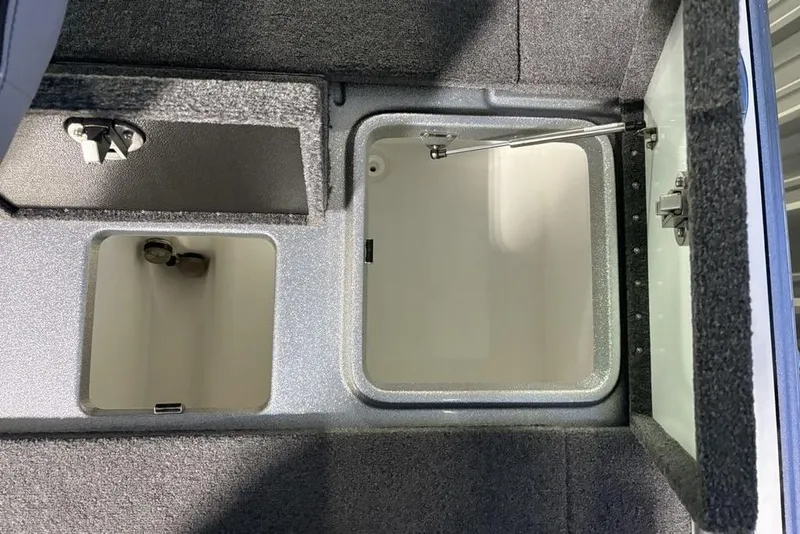 Slide: The Image of 2024 Phoenix 920 Elite storage compartments with open hatches, showcasing interior design. - 28