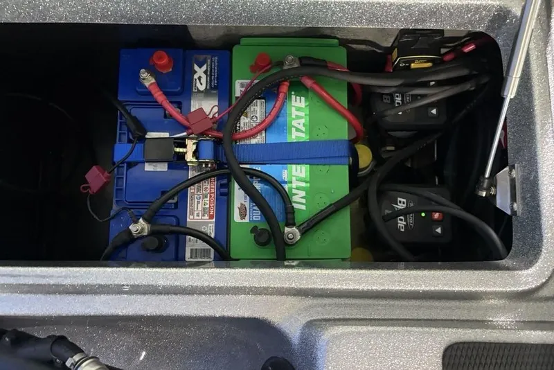 Slide: The Image of 2024 Phoenix 920 Elite battery compartment with multiple batteries and wiring connections. - 32