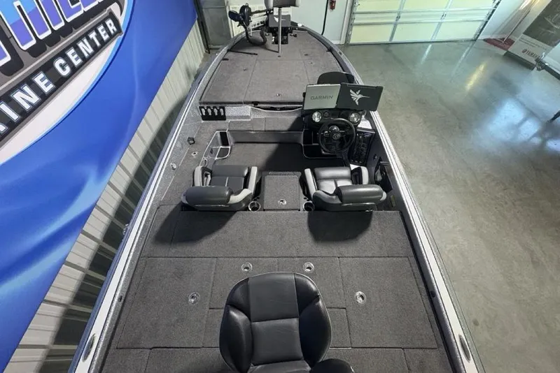 Slide: The Image of 2024 Phoenix 920 Elite boat interior with dual seats and advanced navigation system. - 36