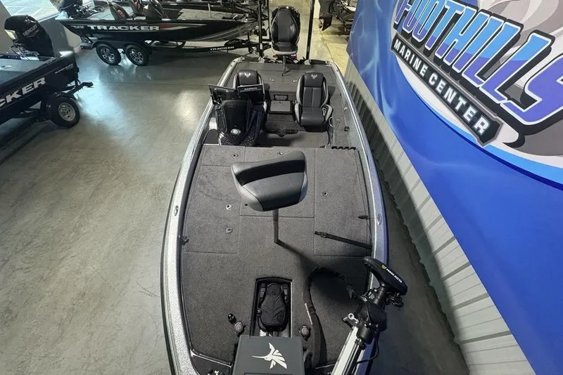 Slide: The Image of 2024 Phoenix 920 Elite boat interior at Foothills Marine Center showroom. - 37
