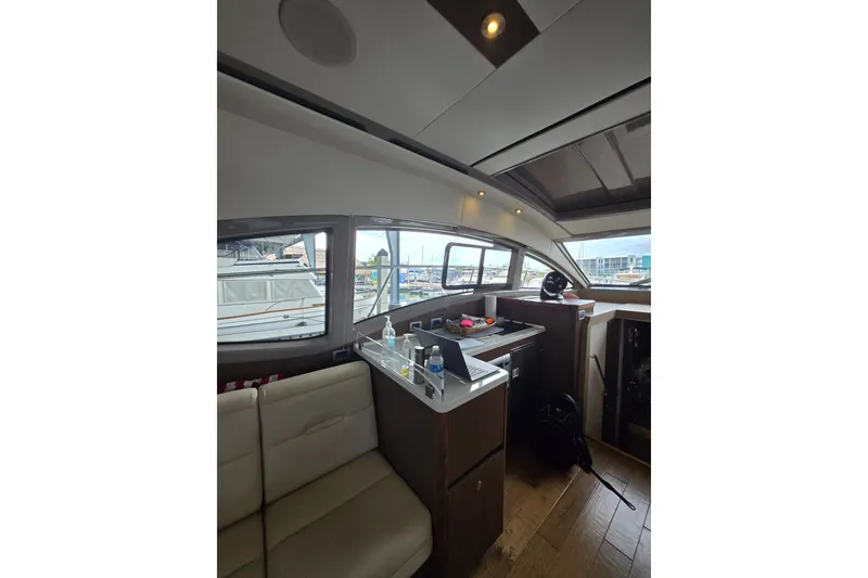 Slide: The Image of Engine compartment of 2017 Sea Ray Sundancer 400 yacht, showcasing mechanical components. - 26