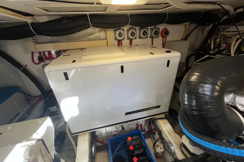 Slide: The Image of Engine room of 2004 Sabre 42 Hardtop Express with Northern Lights generator. - 24