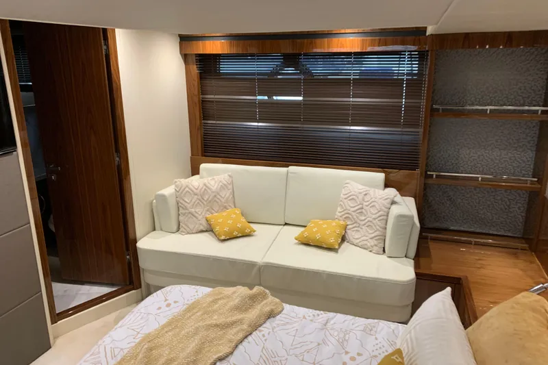 Slide: The Image of Luxurious interior of 2016 Sunseeker Manhattan 65 yacht with elegant sofa and decor. - 17