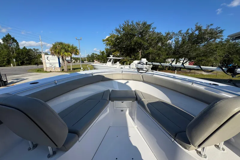 Slide: The Image of 2024 Sportsman Open 302 Center Console boat with spacious seating and sleek design. - 16