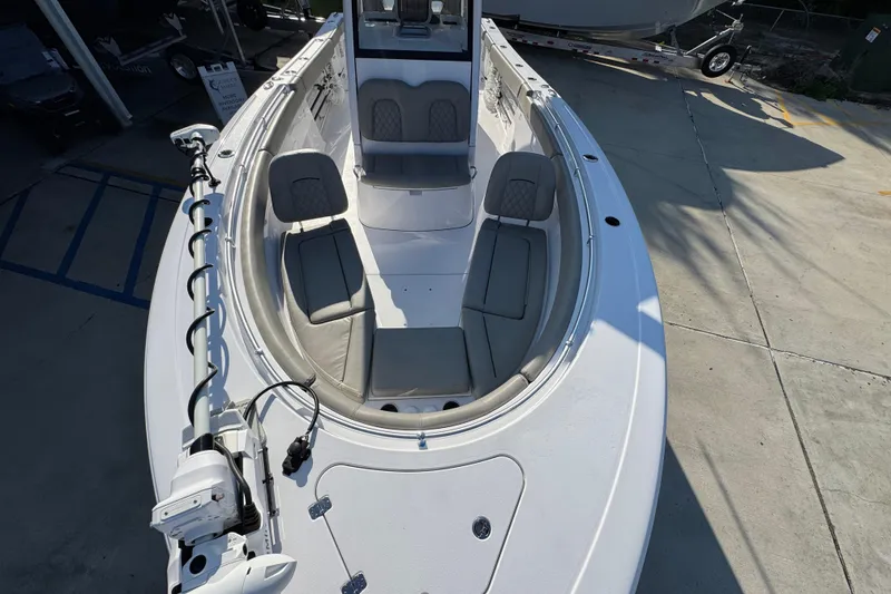 Slide: The Image of 2024 Sportsman Open 302 Center Console boat with spacious seating and modern design. - 19