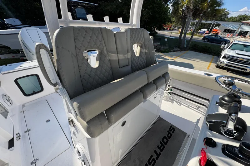 Slide: The Image of 2024 Sportsman Open 302 Center Console with luxurious seating and modern controls. - 36