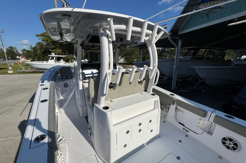 Slide: The Image of 2024 Sportsman Open 302 Center Console boat, featuring spacious deck and modern design. - 39