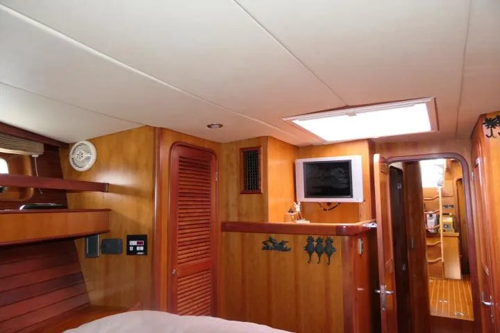 Slide: The Image of Bathroom interior of 2006 Tayana 58 Deck Salon yacht with sink and toilet. - 25