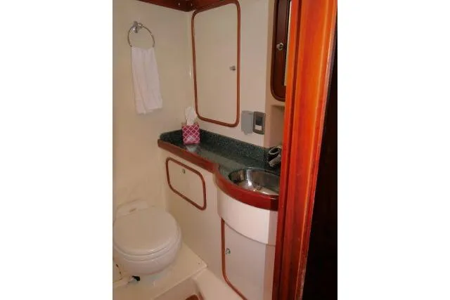 Slide: The Image of Shower area in 2006 Tayana 58 Deck Salon yacht with wooden accents. - 26