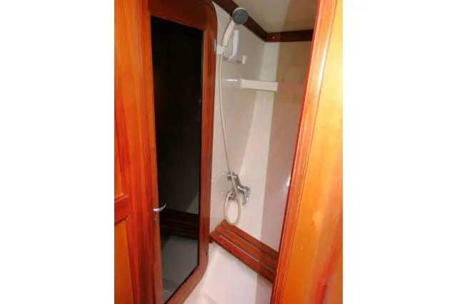 Slide: The Image of Shower area in 2006 Tayana 58 Deck Salon yacht with wooden trim. - 27