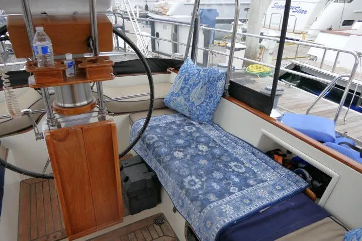 Slide: The Image of Luxurious 2006 Tayana 58 Deck Salon yacht interior with helm and seating area. - 39