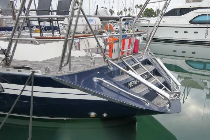 Slide: The Image of Solar panel and lifebuoy on 2006 Tayana 58 Deck Salon yacht. - 65