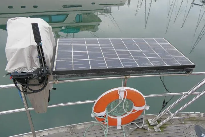 Slide: The Image of 2006 Tayana 58 Deck Salon yacht with solar panels in marina. - 66