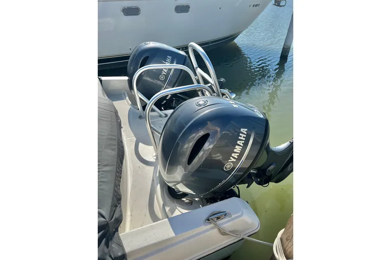 Slide: The Image of Twin Yamaha outboard engines on a 2022 World Cat 230 DC boat. - 11