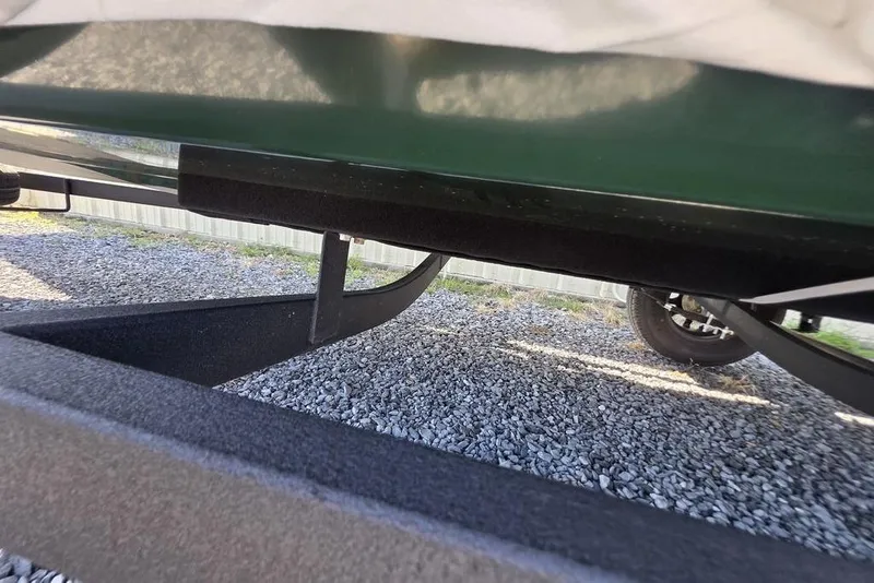 Slide: The Image of 2026 Tracker Bass Tracker Classic Limited boat covered, parked at Bryan's Marine. - 4