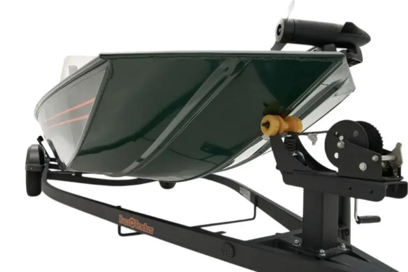 Slide: The Image of 2026 Tracker Bass Tracker Classic Limited interior with beige seats and carpeted deck. - 9