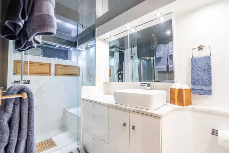 Slide: The Image of Luxurious Maiora Planning 1991 yacht bathroom with modern fixtures and elegant design. - 13