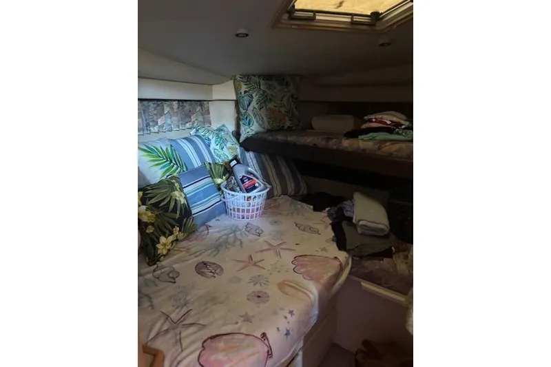 Slide: The Image of Cozy cabin interior of 1996 Carver 355 Aft Cabin Motor Yacht with tropical decor. - 13