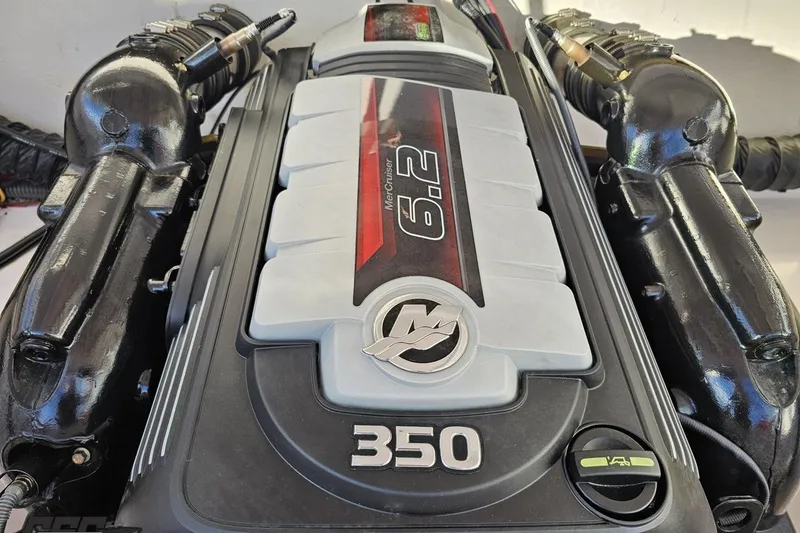 Slide: The Image of Engine of a 2016 Baja 247 Islander boat, featuring a MerCruiser 6.2L 350 horsepower. - 100