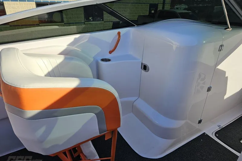 Slide: The Image of 2016 Baja 247 Islander boat interior with white and orange seating. - 59
