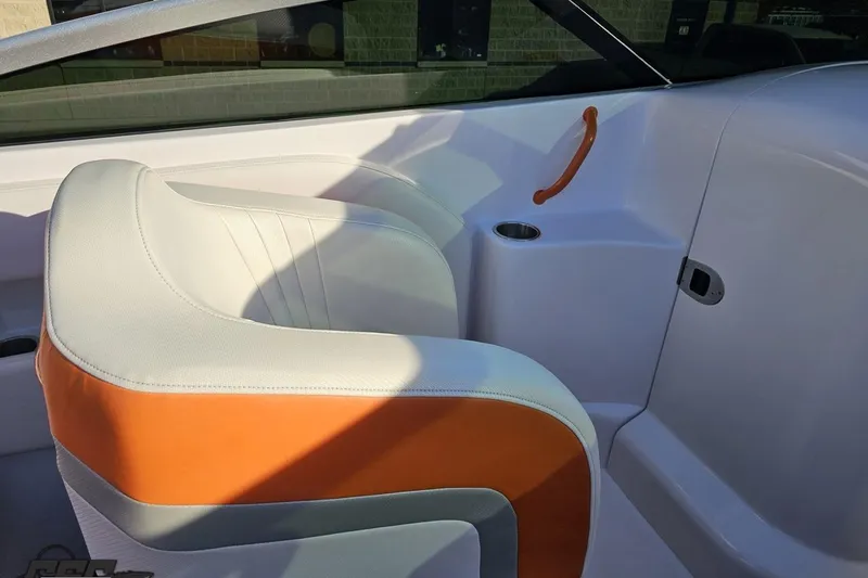 Slide: The Image of 2016 Baja 247 Islander boat interior with orange and white seating. - 60
