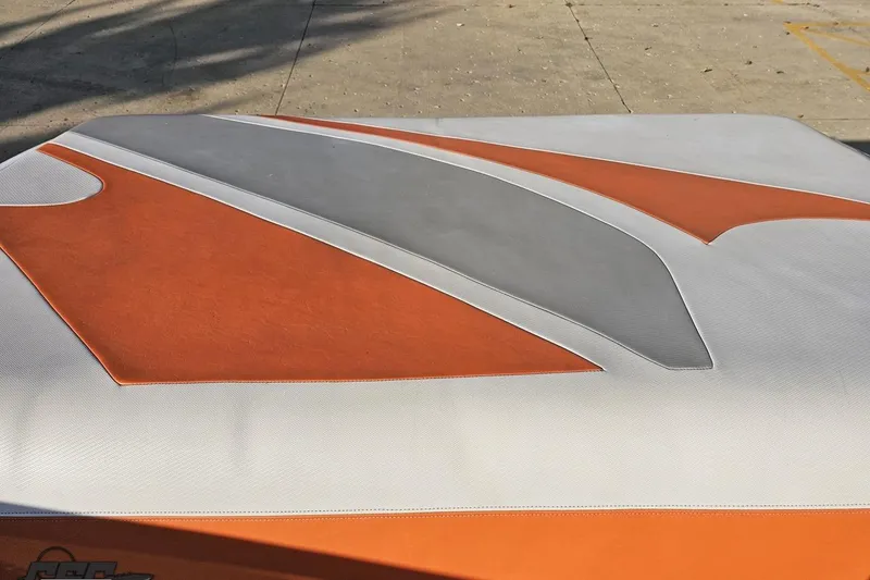 Slide: The Image of Orange and gray upholstery on 2016 Baja 247 Islander boat deck. - 90