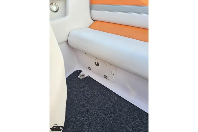 Slide: The Image of Interior of 2016 Baja 247 Islander boat with orange and gray seating. - 91