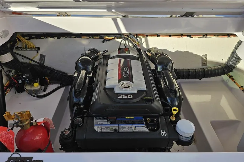 Slide: The Image of 2016 Baja 247 Islander boat engine compartment with Mercury 350 engine. - 98