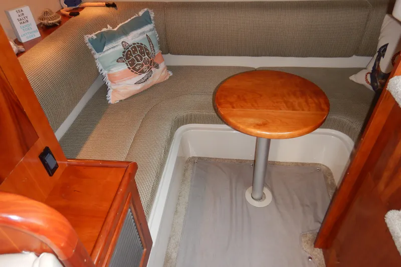 Slide: The Image of 2007 Cruisers 340 Express dashboard with controls and Fireboy system. - 22