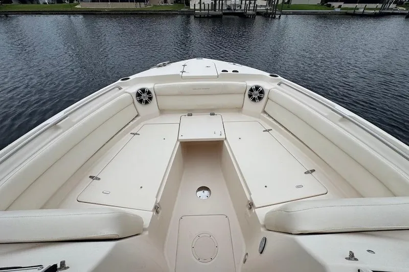 Slide: The Image of 2020 Grady-White Freedom 285 boat interior with spacious seating and water view. - 19