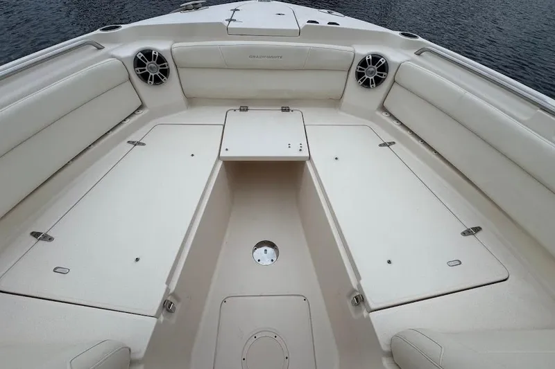 Slide: The Image of 2020 Grady-White Freedom 285 boat interior with spacious seating and storage. - 20
