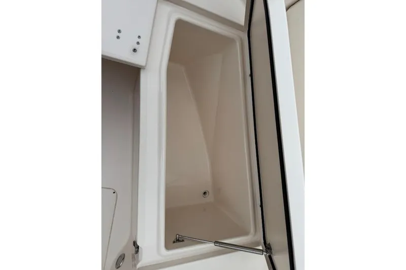 Slide: The Image of Open storage compartment on 2020 Grady-White Freedom 285 boat. - 22